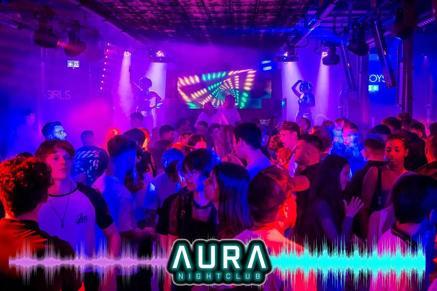 Aura nightclub main dancefloor with state-of-the-art lighting and screens